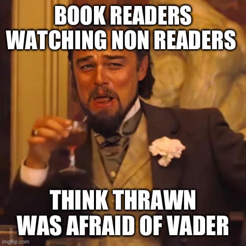 The meme is a screenshot from the 2012 movie "The Hunger Games" where actor Josh Hutcherson, who plays the character Peeta Mellark, has a shocked expression. The text overlayed on the image reads: "When you're reading a book about a character who's a lot more intimidating than the guy in your English Lit class" and "Book nerds: 1, 2,000 year old demigod god: 0".